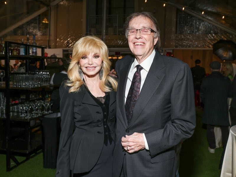 Loni Anderson and Bob Flick at Lifetime's holiday celebration as stars from "It's A Wonderful Lifetime" honor Blue Star Families military spouses, who will receive the Gift of a Lifetime, held at The Maybourne Bevelry Hills on November 28, 2023 in Beverly Hills, California. (Photo by Mark Von Holden/Variety via Getty Images)