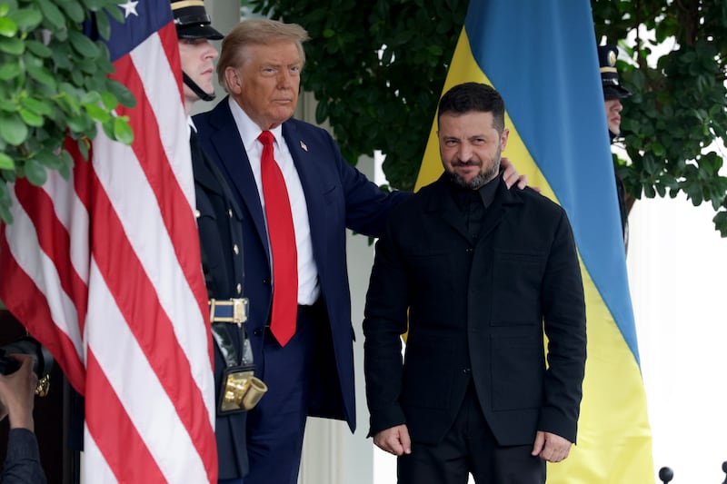 WASHINGTON, DC - AUGUST 18: U.S. President Donald Trump greets Ukrainian President Volodymyr Zelensky at the White House on August 18, 2025 in Washington, DC. President Trump is hosting President Zelensky at the White House for a bilateral meeting and later an expanded meeting with European leaders to discuss a peace deal between Russia and Ukraine.