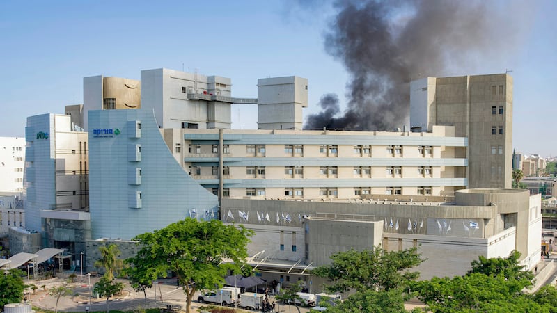 Smoke billows from a building at Soroka Hospital in Beersheba in southern Israel following an Iranian missile attack on June 19, 2025.