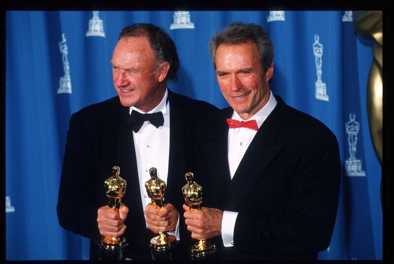 153879 07: Actors Gene Hackman and Clint Eastwood stand with their Oscars at the Academy Awards March 29, 1993 in Los Angeles, CA. The gold-plated bronze human figure was created by American sculptor George Stanley based on sketches made by American motion-picture art director Cedric Gibbons. (Photo by John Barr/Liaison)