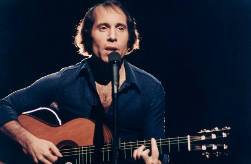 SATURDAY NIGHT LIVE -- Episode 8 -- Pictured: Musical guest Paul Simon performs on November 20, 1976 (Photo by NBCU Photo Bank/NBCUniversal via Getty Images via Getty Images)