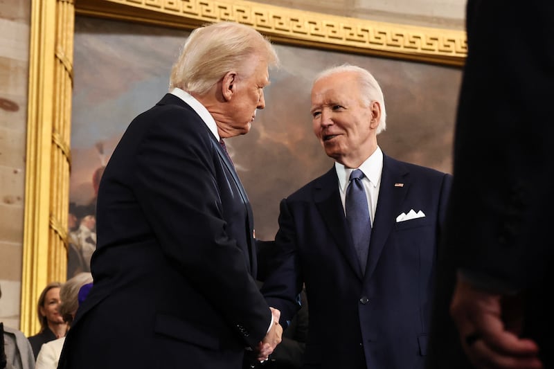 President-elect Donald Trump greets President Joe Biden as he arrives for inauguration ceremonies in the Rotunda of the U.S. Capitol on January 20, 2025 in Washington, D.C.