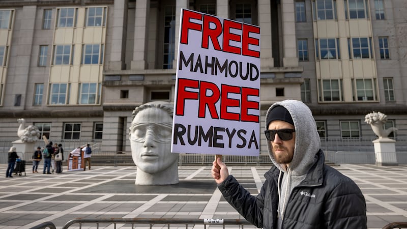 NEWARK, NEW JERSEY, UNITED STATES - 2025/03/28: A protestors sign that reads "Free Mahmoud, free Rumeysa" as hundreds rally outside a New Jersey Federal Courthouse protesting the arrest and detention of Mahmoud Khalil. More protests against the Trump Administration's immigration policies and tactics have spread across the country after Secretary of State Marco Rubio's recent announcement that he has revoked at least 300 student visas for alleged participation in Pro-Palestinian activity on campuses. . (Photo by Michael Nigro/Pacific Press/LightRocket via Getty Images)