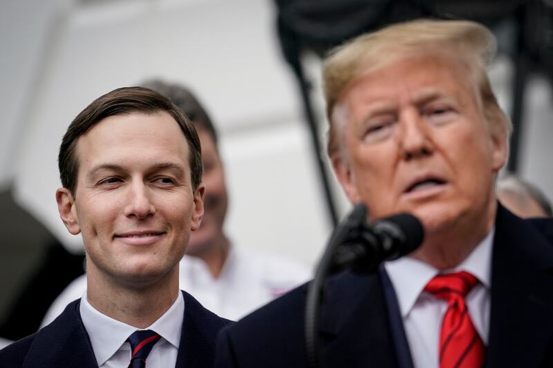 Jared Kushner looks on as U.S. President Donald Trump speaks.