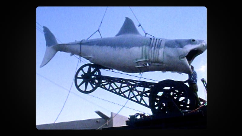 A behind-the-scenes look at the mechanical shark on the set of Jaws.