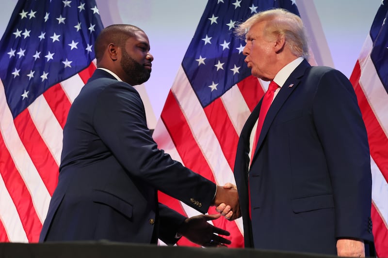 Rep. Byron Donalds (R-FL) shakes hands with U.S. President Donald Trump during the Moms for Liberty Joyful Warriors national summit at the Philadelphia Marriott Downtown on June 30, 2023 in Philadelphia, Pennsylvania.