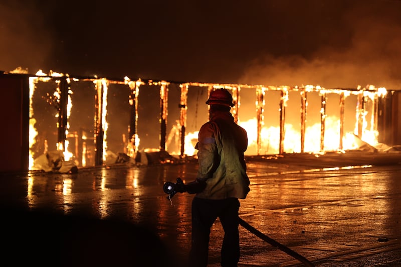 Firefighters battle the Palisades fire as flames rage across Los Angeles, California, United States on January 09, 2025.