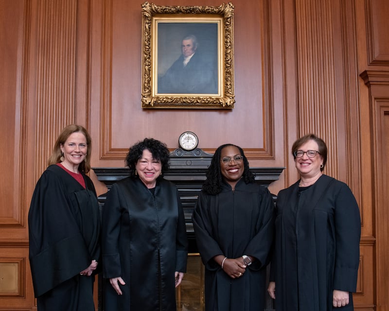 WASHINGTON, DC - SEPTEMBER 30: (EDITORIAL USE ONLY) In this handout provided by the Collection of the Supreme Court of the United States, (L-R) Associate Justices Amy Coney Barrett, Sonia Sotomayor, Ketanji Brown Jackson, and Elena Kagan pose at a courtesy visit in the Justices Conference Room prior to the investiture ceremony of Associate Justice Ketanji Brown Jackson September 30, 2022 in Washington, DC. On June 30, 2022, Justice Jackson took the oaths of office to become the 104th Associate Justice of the Supreme Court of the United States. (Photo by Collection of the Supreme Court of the United States via Getty Images)
