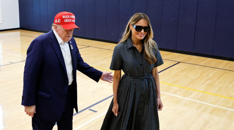 PALM BEACH, FLORIDA - NOVEMBER 05: Republican presidential nominee former President Donald Trump escorts his wife Melania Trump at the polling place in the Morton and Barbara Mandel Recreation Center on Election Day, on November 05, 2024 in Palm Beach, Florida. Trump will hold an Election Night event at the Palm Beach Convention Center. (Photo by Chip Somodevilla/Getty Images)