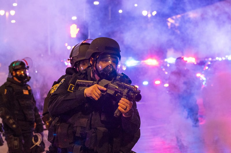 Police have fired non-lethal rounds and teargas at crowds demonstrating against President Trump’s sweeping immigration raids.
