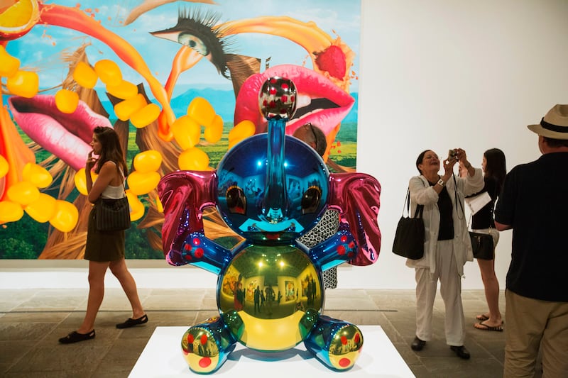 articles/2014/06/26/jeff-koons-s-bright-shiny-objects/140625-jjones-koons-tease_zc7mjh