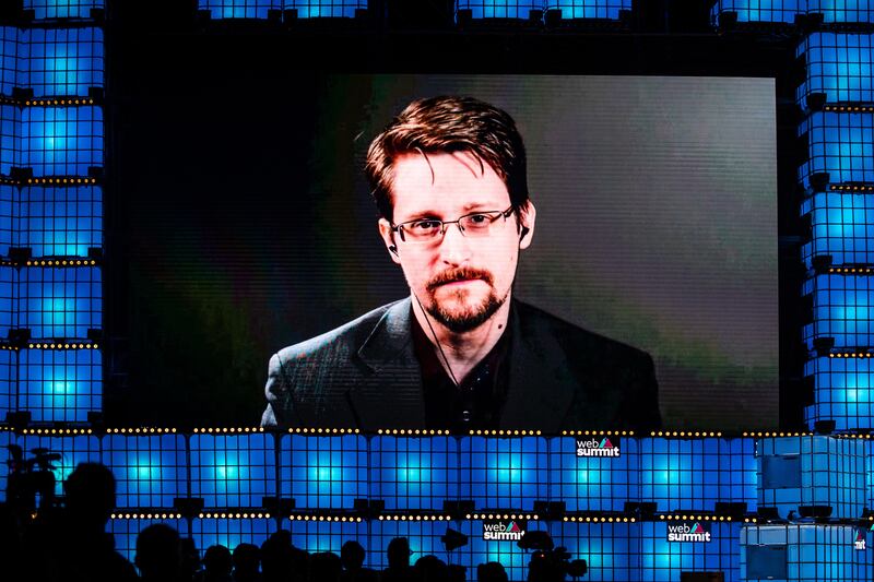 Edward Snowden, former intelligence officer who served the CIA, NSA, and DIA for nearly a decade as a subject matter expert on technology and cyber security, speaks from Russia to the audience for an interview by James Ball, during the annual Web Summit technology conference in Lisbon.