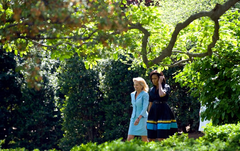Michelle Obama and Jill Biden in the White House Rose Garden.