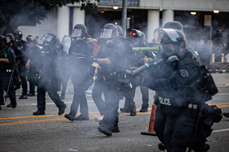 Los Angeles, CA - June 06: LAPD clear the street outside the Metropolitan Detention Center as demonstrators gather in response to ICE raids in Los Angeles on Friday, June 6, 2025 in Los Angeles, CA. (Jason Armond / Los Angeles Times via Getty Images)