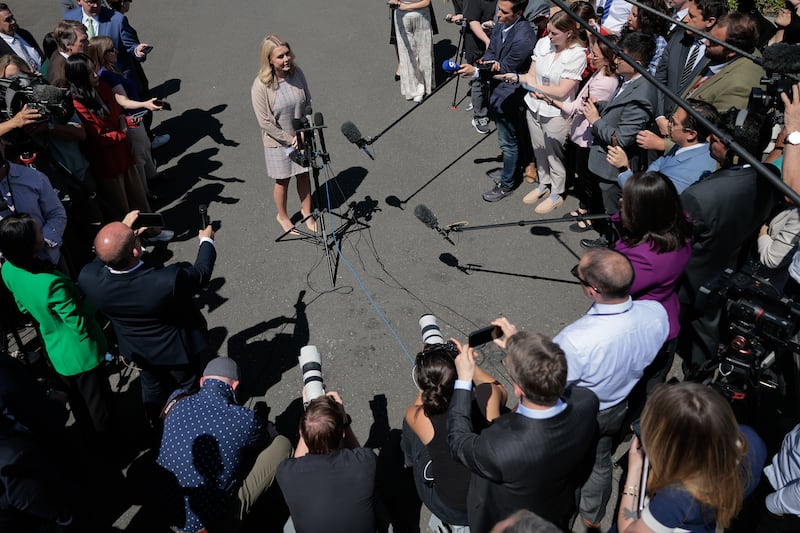 White House Press Secretary Karoline Leavitt talks to reporters on the driveway outside the White House's West Wing on April 23, 2025 in Washington, D.C.