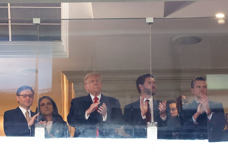 From left: Speaker of the House Mike Johnson, Tulsi Gabbard, president-elect Donald Trump, vice president-elect JD Vance, and Pete Hegseth attend the Army-Navy football game at Northwest Stadium on December 14, 2024 in Landover, Maryland.