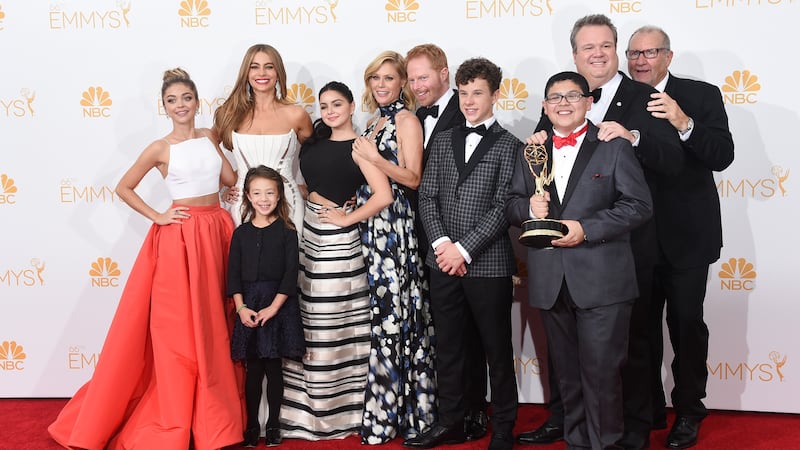 LOS ANGELES, CA - AUGUST 25: Actresses Sarah Hyland, Sofía Vergara, Aubrey Anderson-Emmons, Julie Bowen and Ariel Winter, Jesse Tyler Ferguson, Nolan Gould, Rico Rodriguez, Eric Stonestreet and Ed O'Neill, winners of the Outstanding Comedy Series Award for "Modern Family" pose in the press room during the 66th Annual Primetime Emmy Awards held at Nokia Theatre L.A. Live on August 25, 2014 in Los Angeles, California.