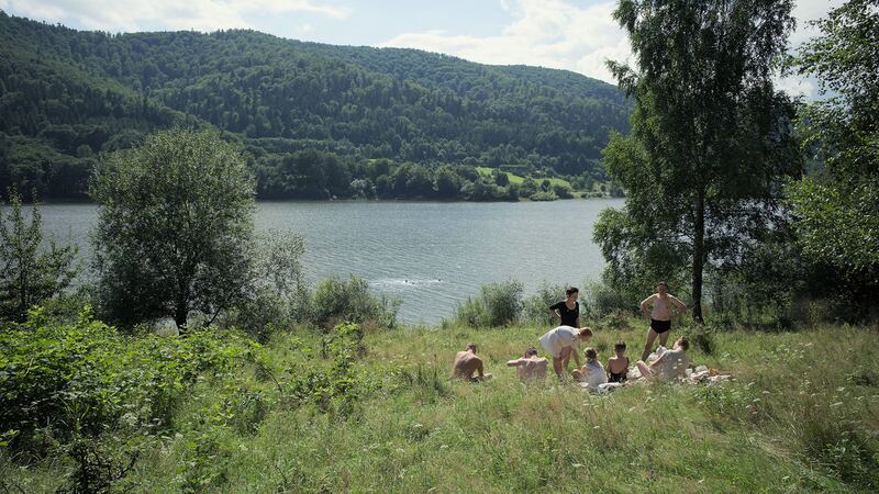 A photo including a film still from the film Zone of Interest