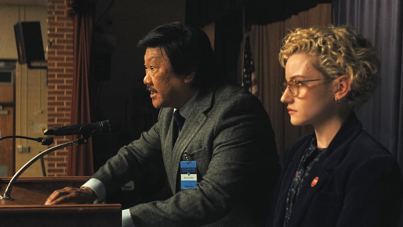 Benedict Wong and Julia Garner in Weapons.
