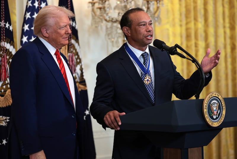 Tiger Woods speaks alongside U.S. President Donald Trump during a reception honoring Black History Month in the East Room of the White House on February 20, 2025 in Washington, DC.