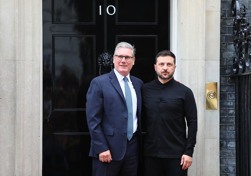 LONDON, ENGLAND - AUGUST 14: Britain's Prime Minister Keir Starmer greets Ukrainian President Volodymyr Zelenskyy at number 10 Downing Street on August 14, 2025 in London, United Kingdom. Zelenskyy's UK visit comes following his trip to Berlin to attend virtual meetings with European leaders and US President Trump to discuss the strategy for talks taking place between Trump and Russian President Vladimir Putin on Friday in Alaska, where they will discuss ending the war in Ukraine. (Photo by Alishia Abodunde/Getty Images)