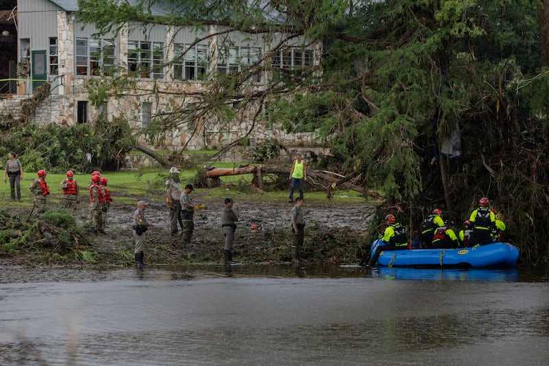 Camp Mystic recovery workers