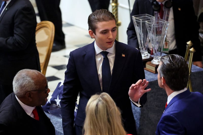 Barron Trump speaks to Pete Hegseth on Capitol Hill following the 60th inaugural ceremonies on January 20, 2025, in Washington, D.C.