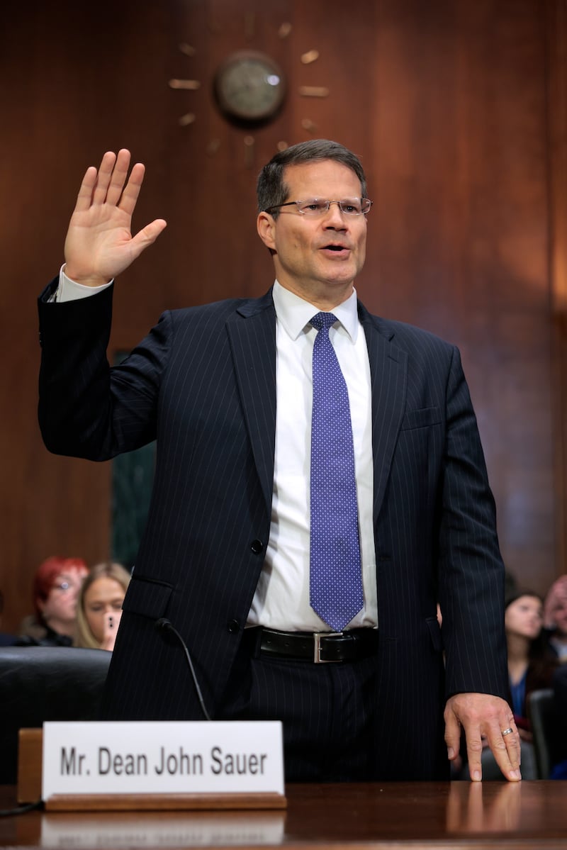 Sauer being sworn in during his Senate confirmation hearing