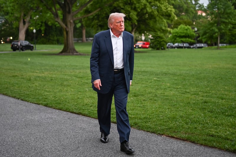 President Donald Trump walking up to speak with the media where he declared he is a "big fan of crypto" on May 4 ahead of the industry holding a fundraiser for his MAGA Inc. super PAC on Monday.