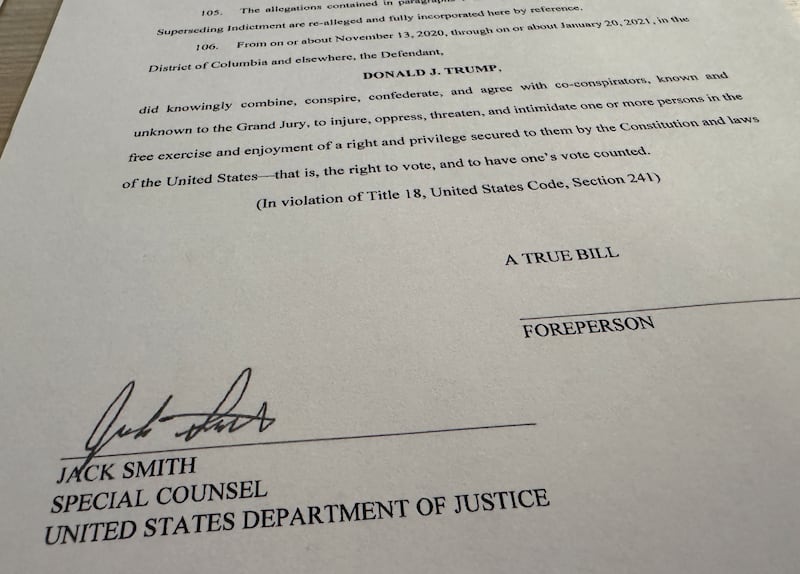 Special Counsel Jack Smith's signature is seen on a revised indictment in the 2020 election subversion case against Donald Trump after U.S. prosecutors obtained the indictment in Washington, U.S., August 27, 2024.