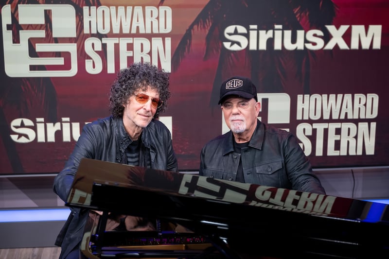 Stern, pictured here with Billy Joel, hasn't addressed a report about his show ending directly. He did, however, promise to return after his summer break ends next month.