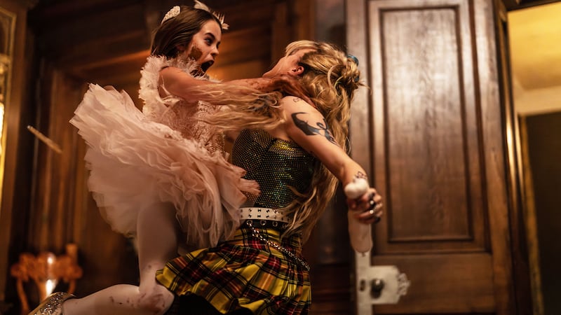 A photo still of Alisha Weir and Kathryn Newton in 'Abigail'