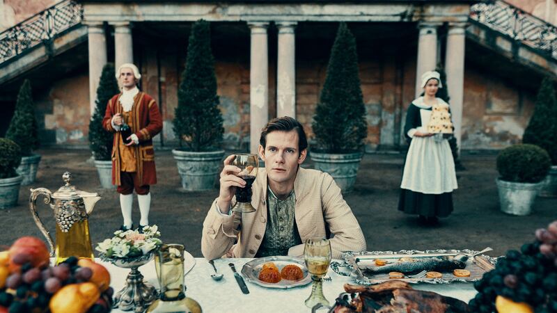 A photo including a still from the film The Promise Land