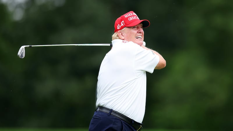 Donald Trump golfs at the Trump National Golf Club in August 2023.