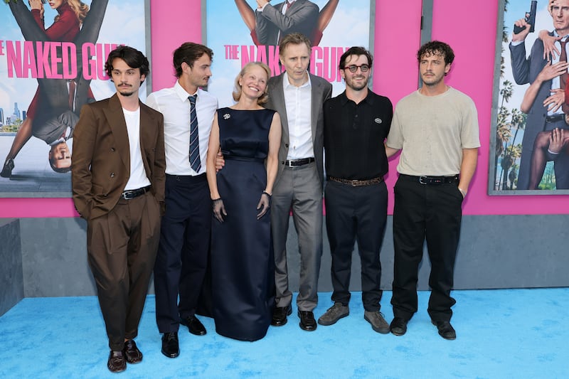 Dylan Jagger Lee, Brandon Thomas Lee, Pamela Anderson, Liam Neeson, Daniel Neeson, and Micheál Neeson attend "The Naked Gun" New York premiere