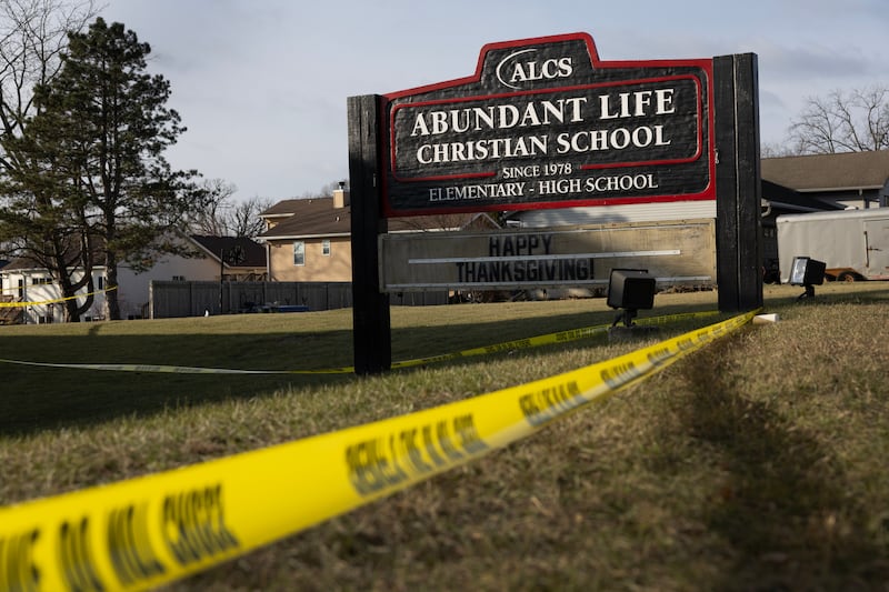 Crime scene tape continues to be stretched around Abundant Life Christian School as police continue to investigate the shooting in Madison, Wisconsin.