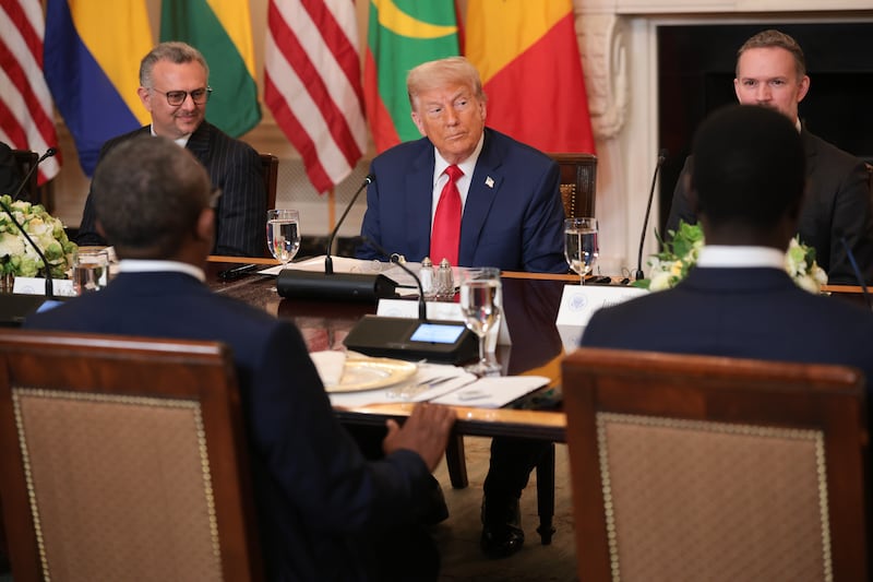 President Donald Trump listens during a multilateral lunch with the leaders of Gabon, Guinea-Bissau, Liberia, Mauritania and Senegal.