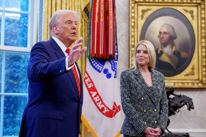 WASHINGTON, DC - FEBRUARY 5: U.S. President Donald Trump, accompanied by newly sworn-in U.S. Attorney General Pam Bondi, speaks to member of the media in the Oval Office at the White House on February 05, 2025 in Washington, DC. The Senate confirmed Bondi as Attorney General with a 54-46 vote on Tuesday. (Photo by Andrew Harnik/Getty Images)