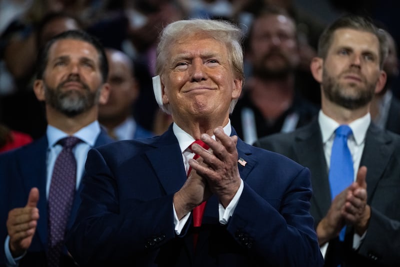 WASHINGTON - JULY 15: Former President Donald Trump, the Republican presidential nominee, is pictured with his sons Don Jr., left, and Eric, in Fiserv Forum on the first day of Republican National Convention in Milwaukee, Wis., on Monday, July 15, 2024. (Tom Williams/CQ-Roll Call, Inc via Getty Images)