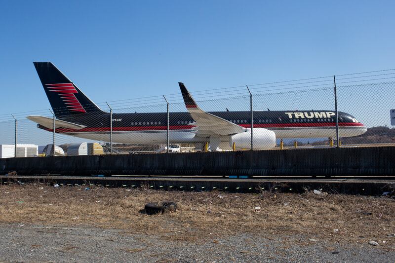 NEWBURGH, NY - MARCH 22: Donald Trump's personal 757 airplane sits at the edge of a runway in need of repairs, where it has been unused since Joe Biden's inauguration, on March 22, 2021 at Stewart Airport outside Newburgh, New York. (Photo by Andrew Lichtenstein/Corbis via Getty Images)