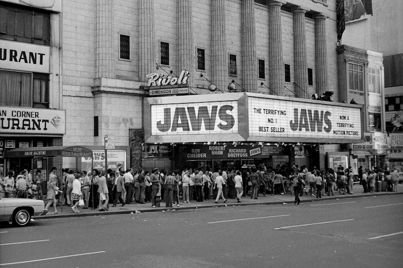 People line up outside of the Rivoli Theater in New York City to see Jaws in 1975.