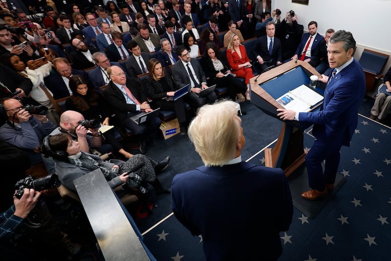 WASHINGTON, DC - JANUARY 30: U.S. Secretary of Defense Pete Hegseth (R) joins President Donald Trump for a news conference about the collision of an American Airlines flight with a military helicopter near Ronald Reagan National Airport in the Brady Press Briefing Room at the White House on January 30, 2025 in Washington, DC. Officials said they believe that all 64 people on the commercial jet and the three service members on the U.S. Army helicopter perished when they collided in midair and crashed into the Potomac River airport outside Washington, D.C. on Wednesday. (Photo by Chip Somodevilla/Getty Images)