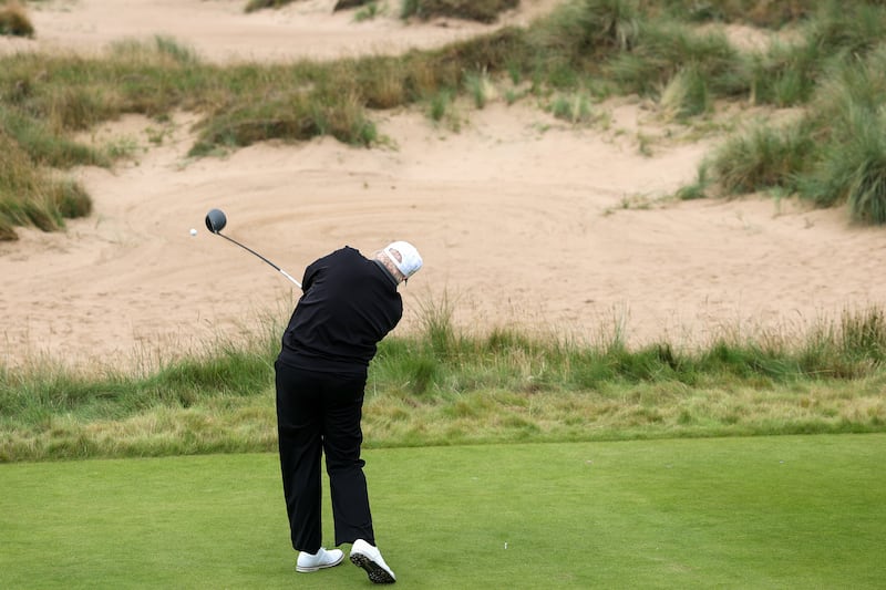 President Donald Trump tees off after opening of his new golf course at his Trump International Golf links resort on July 29, 2025 in Balmedie, Scotland.