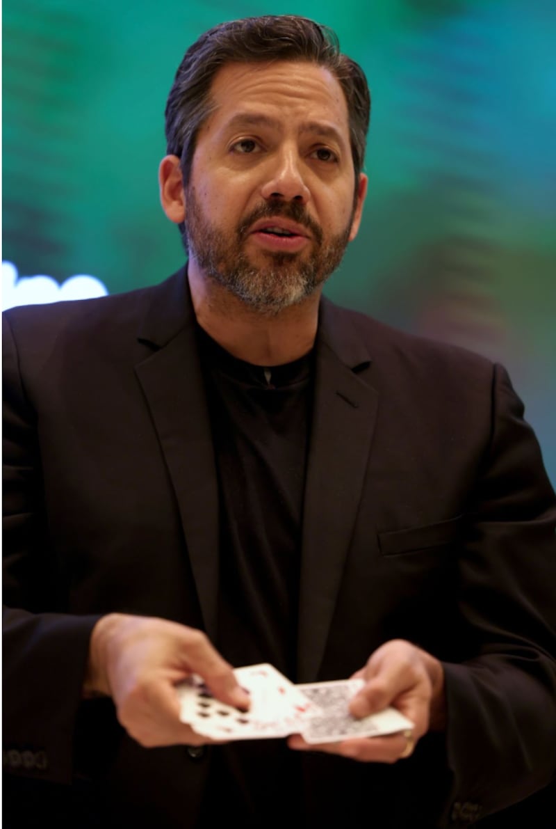 David Blaine performs a card trick.