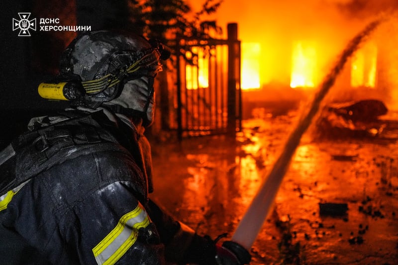 Firefighters tackle a blaze in Kherson—Russia has ramped up its attacks on Ukraine this year.