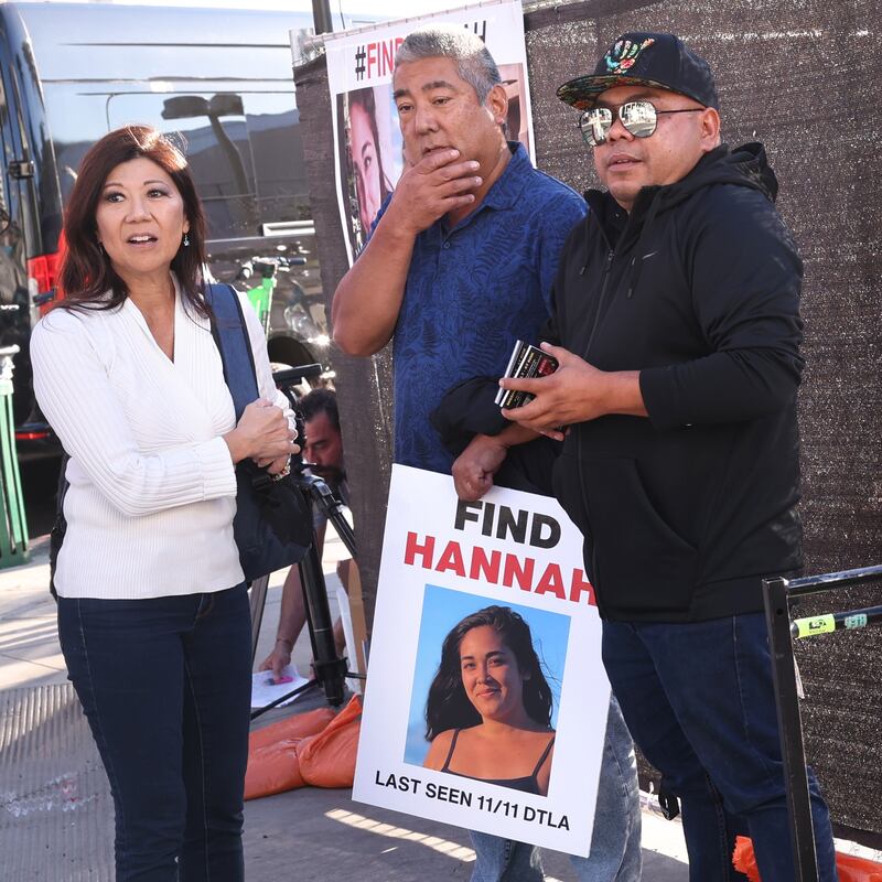 Los Angeles, California November 21, 2024-Volunteers put up flyers of missing Maui woman Hannah Kobayashi outside Crypto.com Arena in Downtown Los Angeles Thursday. (Wally Skalij/Los Angeles Times via Getty Images)