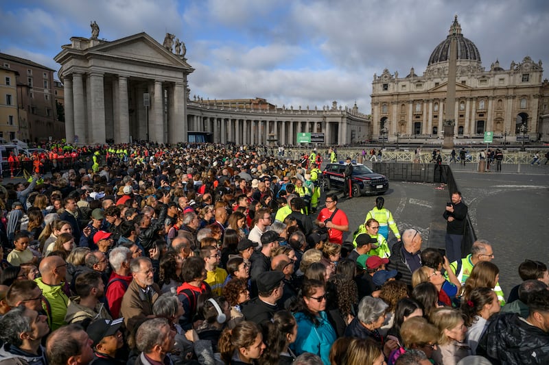 Faithful join a long line outside St Peter's Square to view the body of Pope Francis laying in state inside St Peter's Basilica, on April 25, 2025 in Vatican City, Vatican. Pope Francis, who died on April 21 aged 88, is lying in state for a final day ahead of Saturday’s funeral in St. Peter's Square.