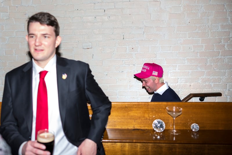 Link Lauren, former advisor to Robert F. Kennedy Jr., climbs the stairwell at the "Make America Hot Again" event Inside Butterworth's in the Capitol Hill neighborhood of Washington on April 10, 2025.