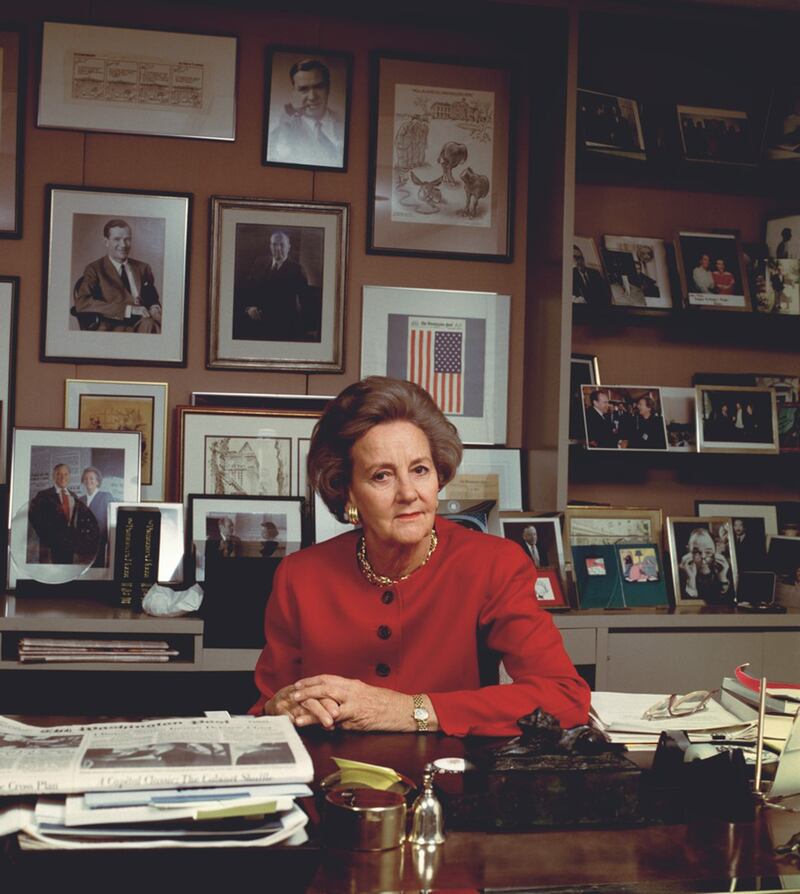 Washington Post owner Katharine Graham is photographed for Time & Life in 1993 at her Washington Post desk in Washington, DC. (Photo by Diana Walker/The Chronicle Collection/Getty Images)