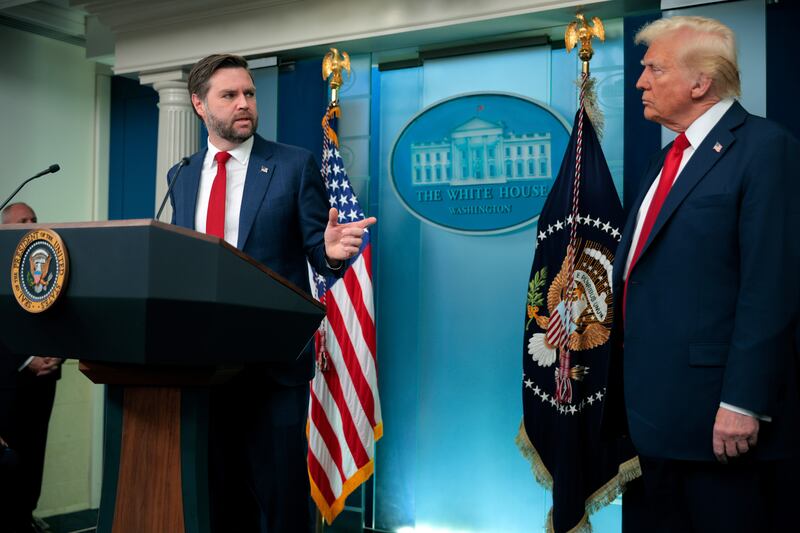 WASHINGTON, DC - JANUARY 30: U.S. Vice President JD Vance (L) takes the podium from U.S. President Donald Trump as they speak to reporters about the collision of an American Airlines flight with a military Black Hawk helicopter near Ronald Reagan National Airport, in the Brady Press Briefing Room at the White House on January 30, 2025 in Washington, DC. Officials believe that all 64 people on the commercial jet and the three service members on the U.S. Army helicopter died when they collided midair and crashed into the Potomac River airport outside Washington, D.C. on Wednesday. (Photo by Chip Somodevilla/Getty Images)